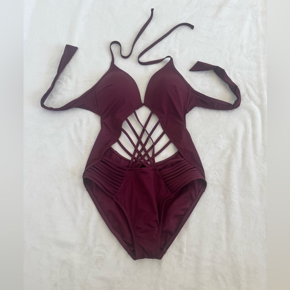 Kenneth Cole Size Medium One Piece Bathing Suit. Plum. Halter style w/ cut outs.